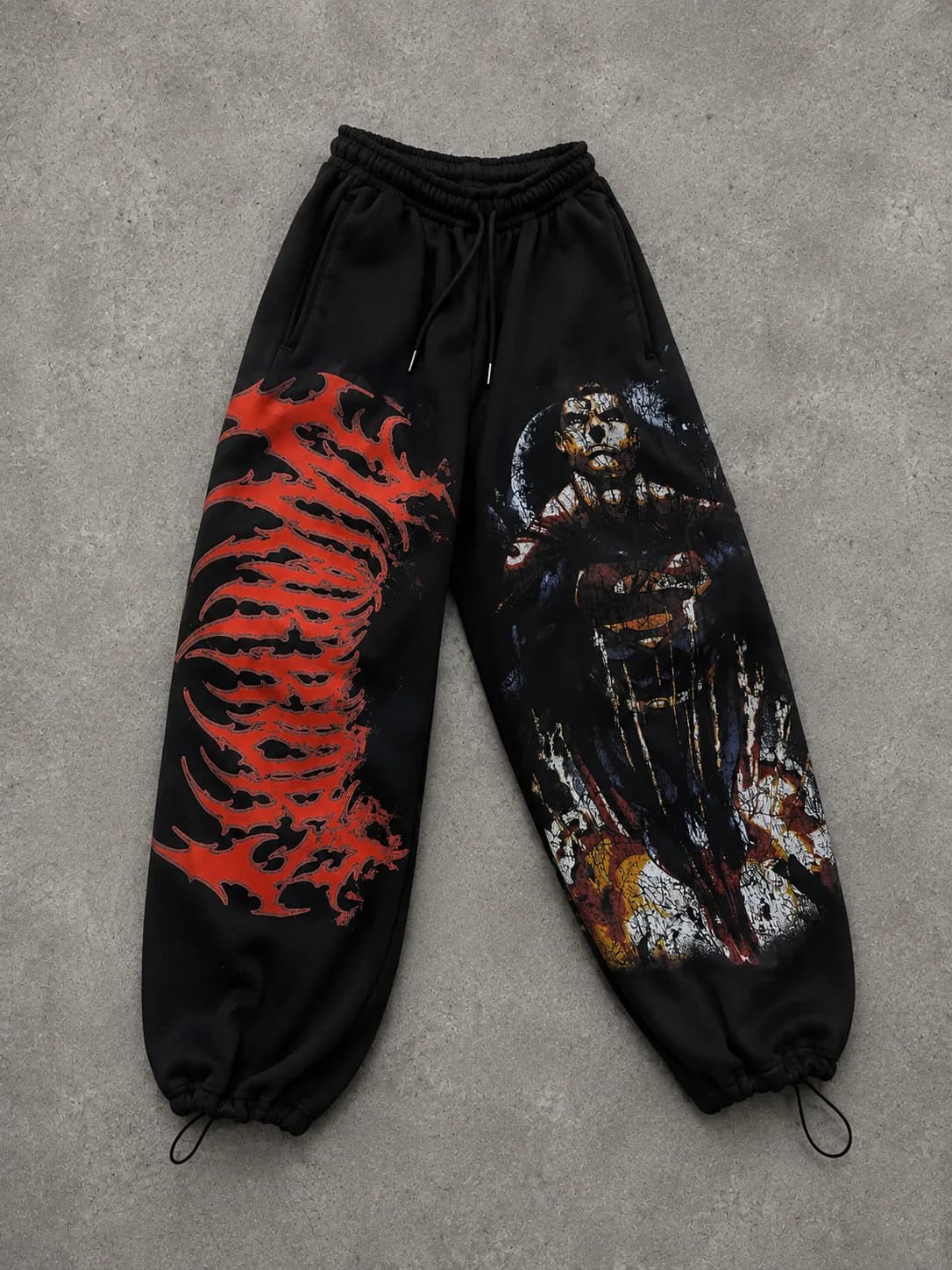 Jogger negro oversize con gráfica dark anime